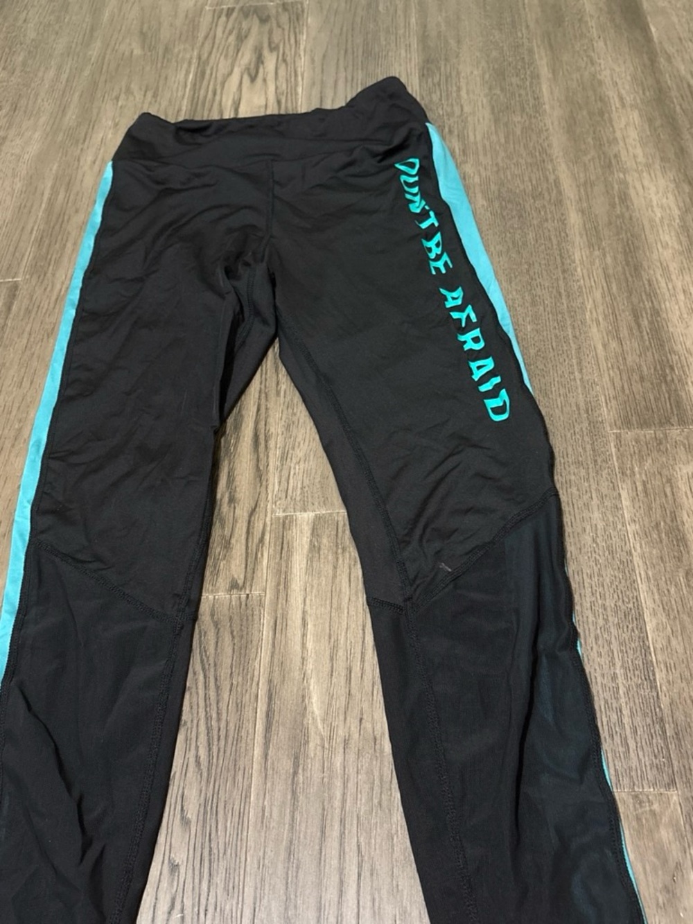 SHEIN Black Leggings with Teal Side Stripes and 'Don't Be Afraid' Print